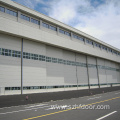 Flexible hangar door in parking lot